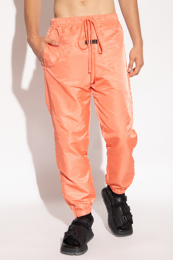 Orange Track pants with logo Fear Of God Essentials Vitkac Italy